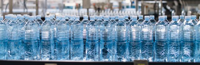 Water bottles on an assembly line.